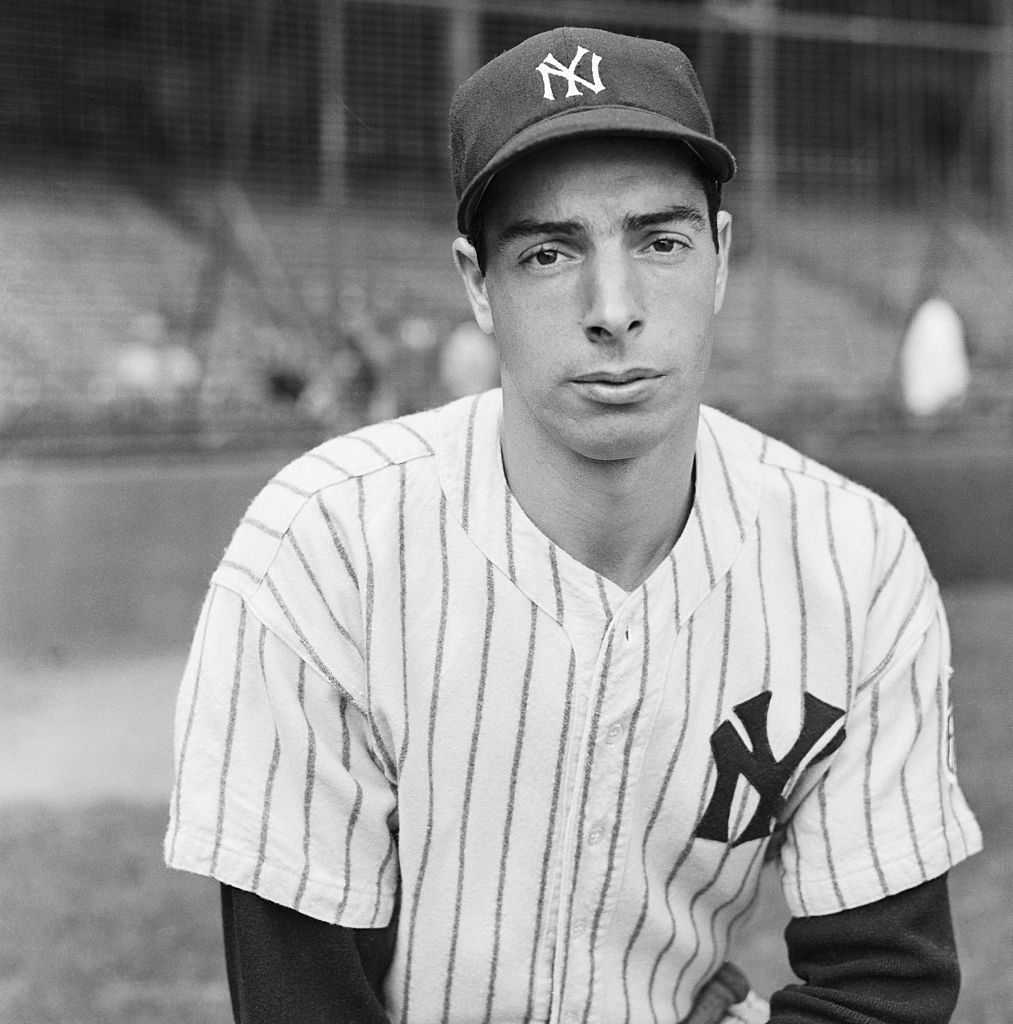 (Original Caption) 9/24/1942-New York, NY Joe DiMaggio, ace batter and outfielder of the New York Yankees, should be happy because his team won the American League pennant, but he doesn't look it. Maybe he's reflecting on the confusing affairs of the National Leaguers, whom he'll have to battle in the World Series.