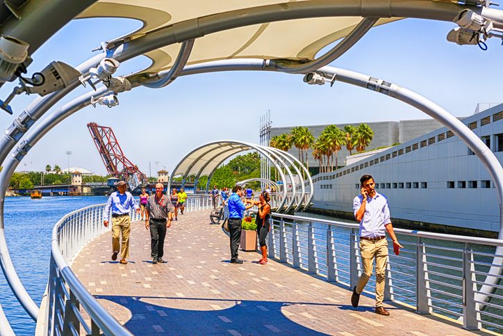 People on the Riverwalk in downtown Tampa FL